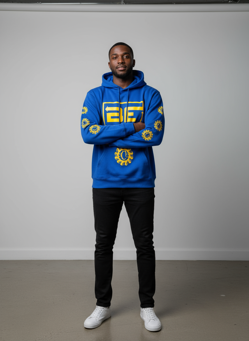 Black male model in blue hoodie with yellow logos banner
